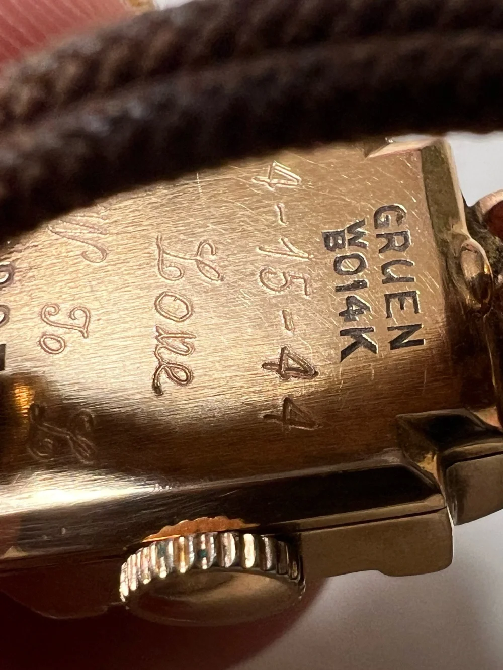 Gruen Precision wristwatch crafted in 14k rose gold with rubies and diamonds
